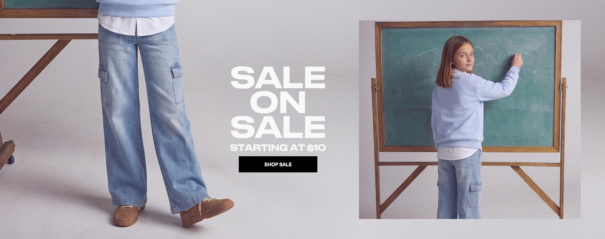 A promotional banner featuring a model wearing light blue wide-leg cargo jeans, shown from the waist down on the left, and standing by a chalkboard on the right. The center features the text 'SALE ON SALE STARTING AT $10' with a black 'SHOP SALE' button.
